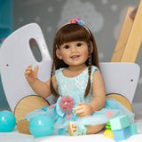 Doll in a blue dress with toys 