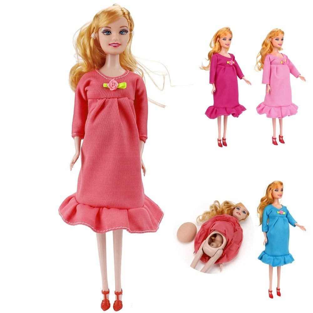 Pregnant doll in a pink dress with a baby doll, on a white background