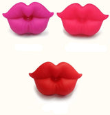 Three pink and red lip-shaped pacifier.