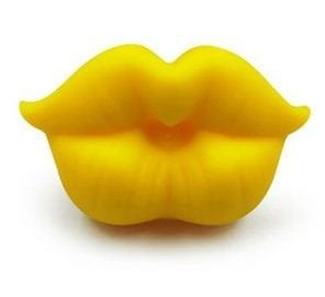 Yellow lip-shaped baby pacifier