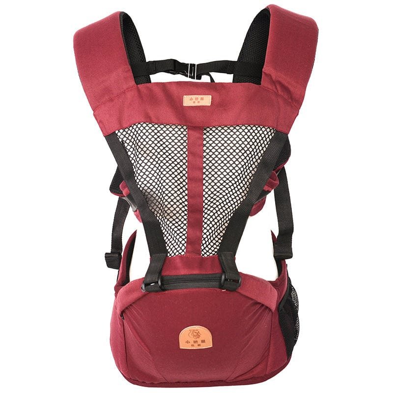 Red baby carrier with black straps on a white background