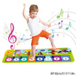 Child playing on a colorful musical mat with music notes around