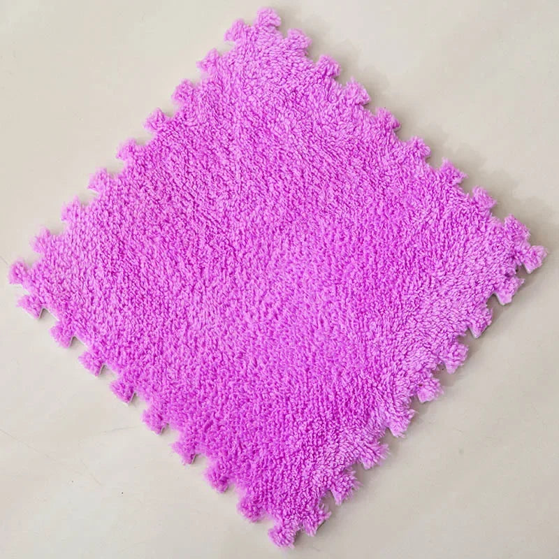 Purple foam puzzle mat on a beige background