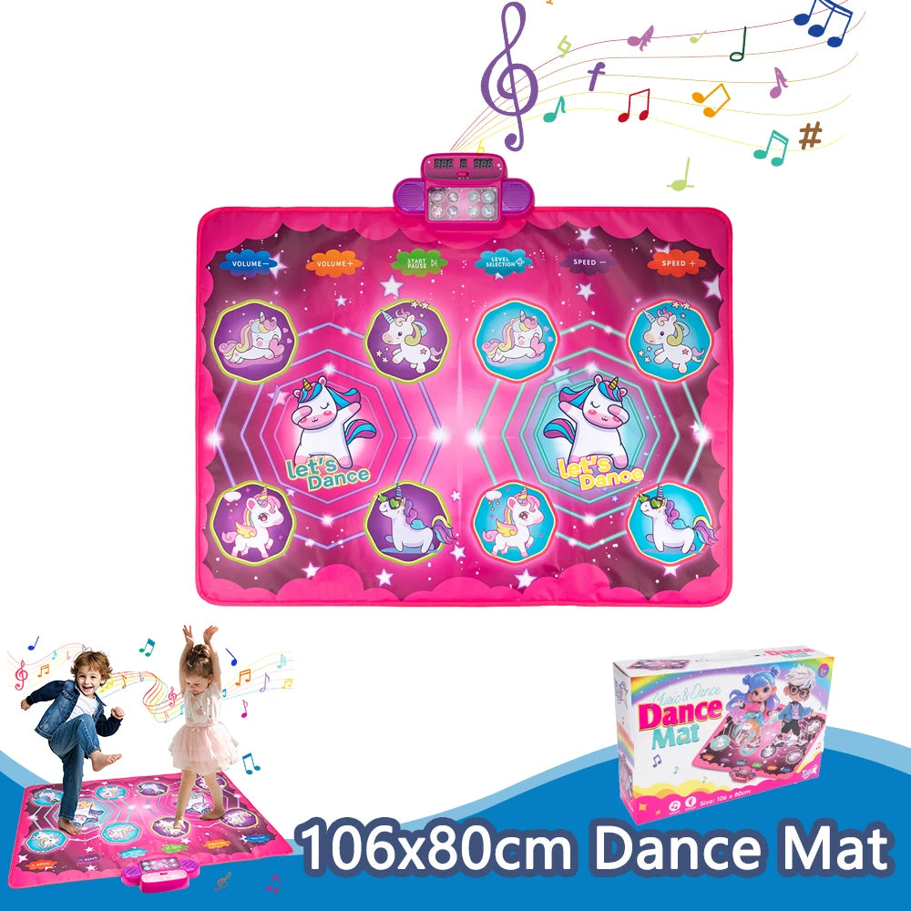 Pink dance mat with unicorn design and music notes, featuring a control panel and two children dancing on a sample mat.