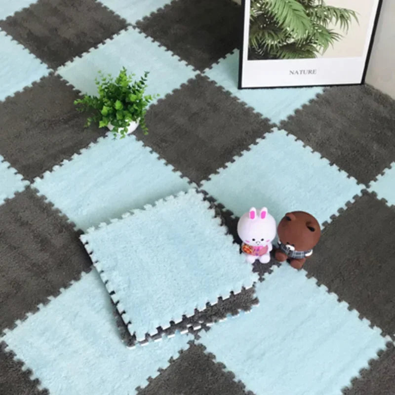 Checkered foam puzzle mat with two small figurines and a plant on a checkered floor.
