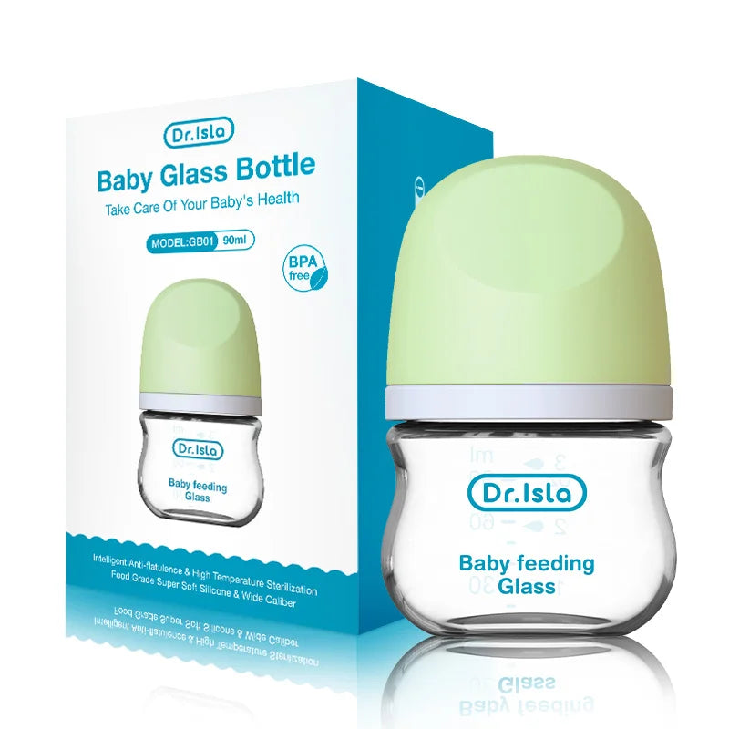 Dr. Isla baby feeding glass bottle with green cap and packaging on a white background