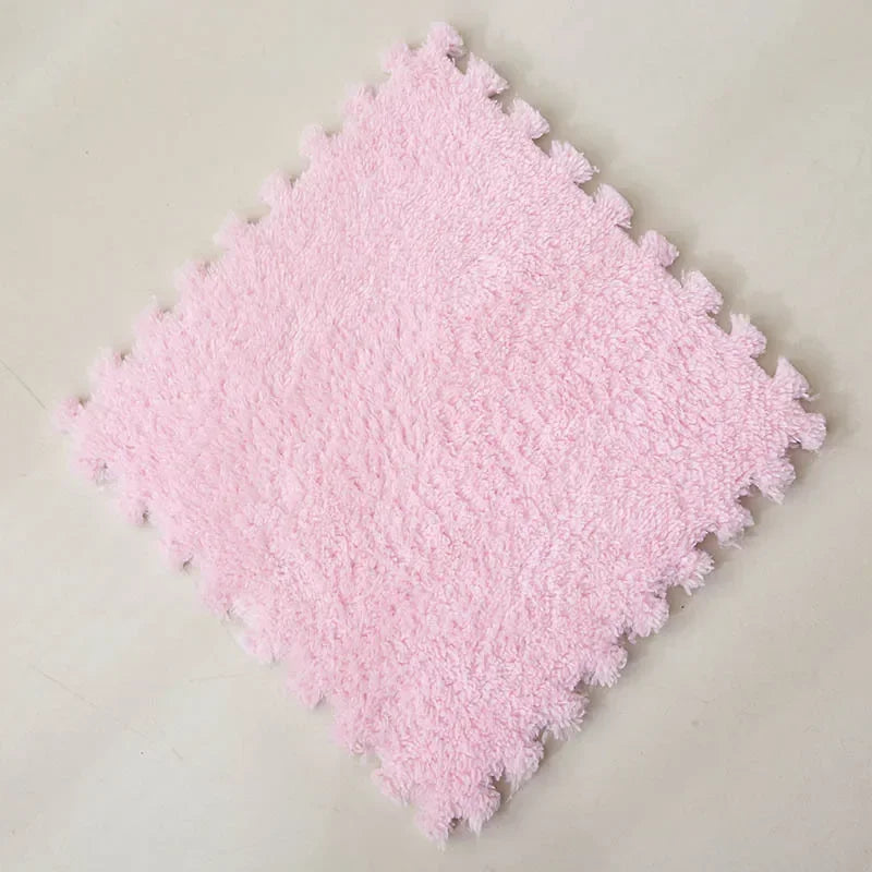 Pink textured square tile on a light gray background