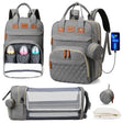 Gray diaper bag with multiple compartments and accessories on a white background