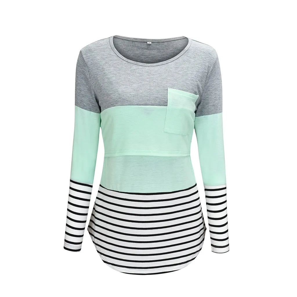 Color-blocked long-sleeve top with gray, mint green, and striped design on a white background