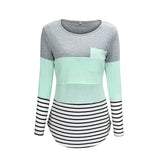 Color-blocked long-sleeve top with gray, mint green, and striped design on a white background