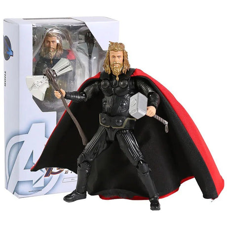 Thor action figure with red cape and hammer in front of packaging
