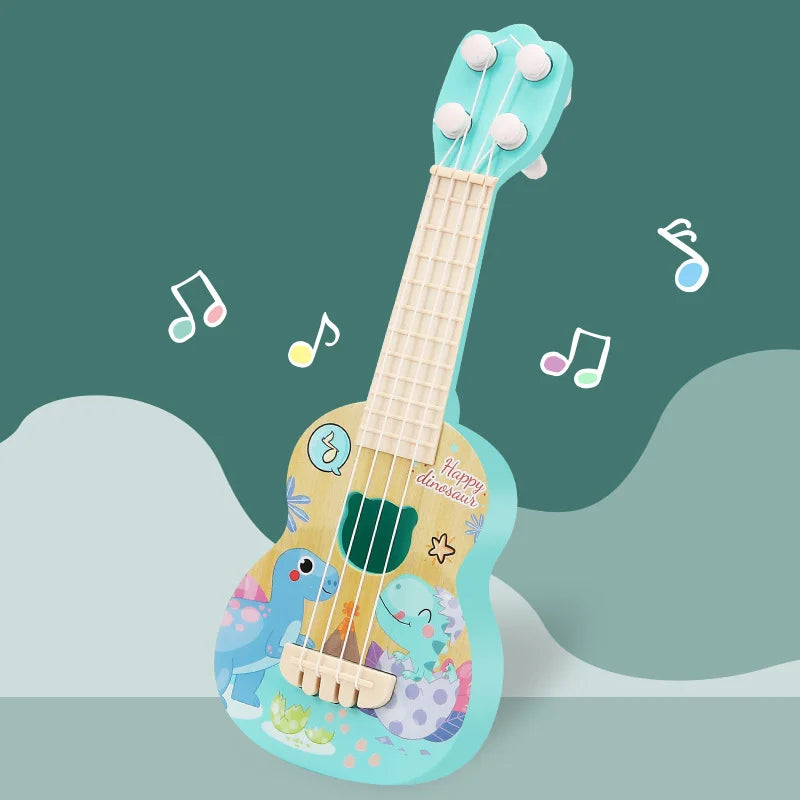 Children's toy guitar with dinosaur design on a green background