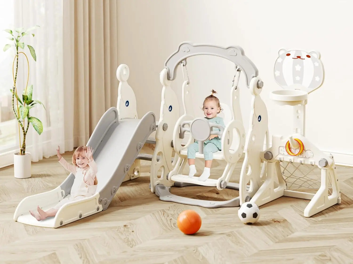 Children's playset with slide and swing on a wooden floor