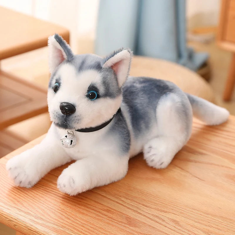 Plush toy husky dog on a wooden surface with a blurred background