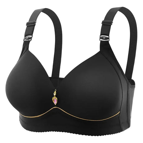 Black bra with decorative charm on a white background