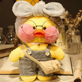 Plush toy duck wearing glasses and overalls on a table with books and jars.