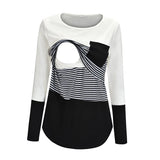 White and black long-sleeve top with a striped design on a white background