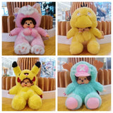 Four plush toys in different costumes on a wooden surface with a blurred indoor background.
