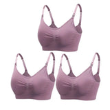 Set of three purple bras on a white background