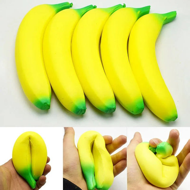 Set of yellow squishy bananas with green tips