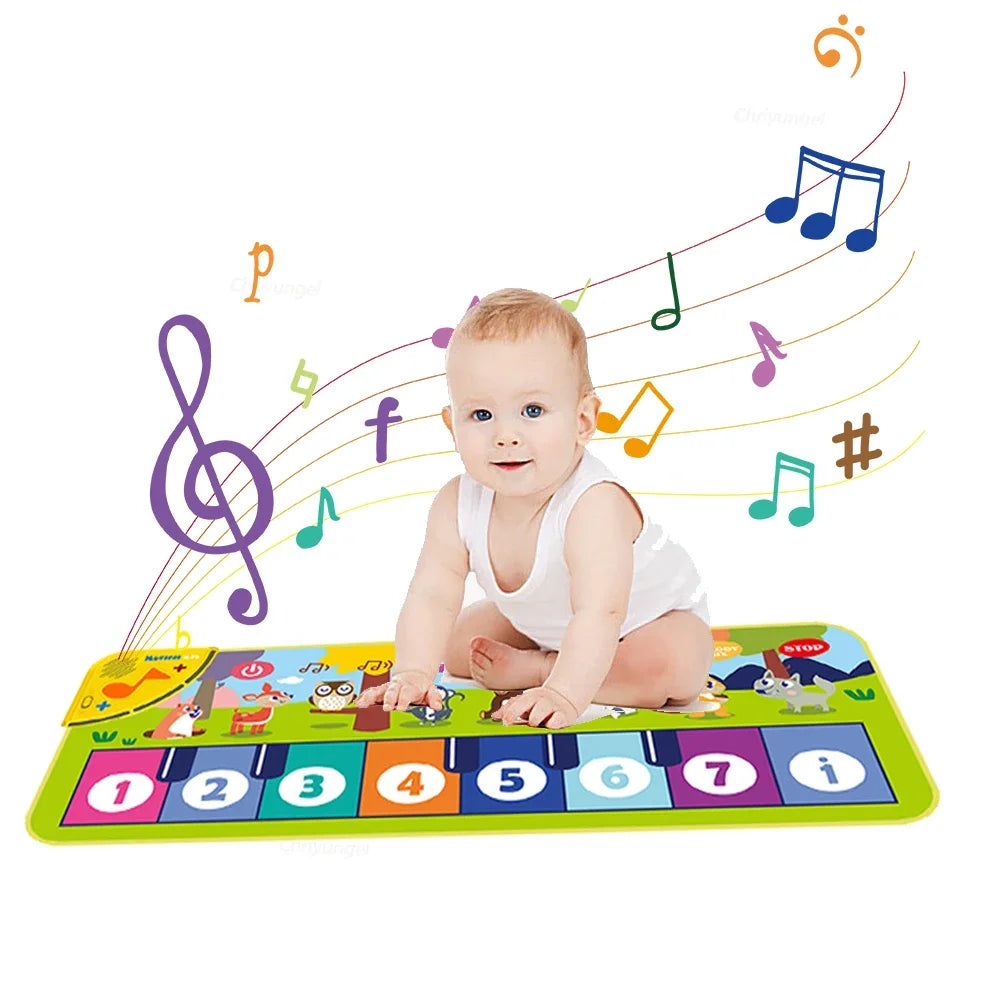 Baby playing on a colorful musical mat with cartoon animals and numbers