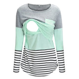 Long-sleeve top with gray and mint green color block and black and white striped bottom on a white background