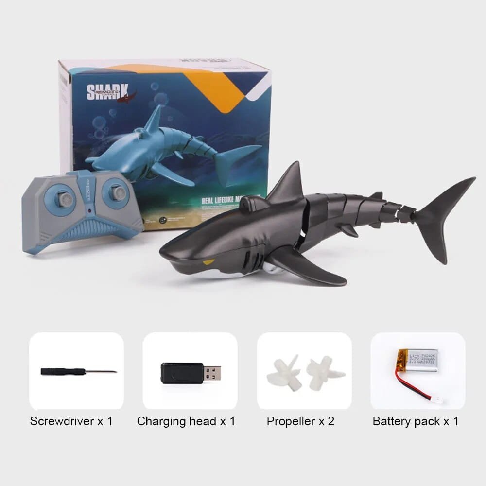 Remote-controlled toy shark with packaging and accessories.