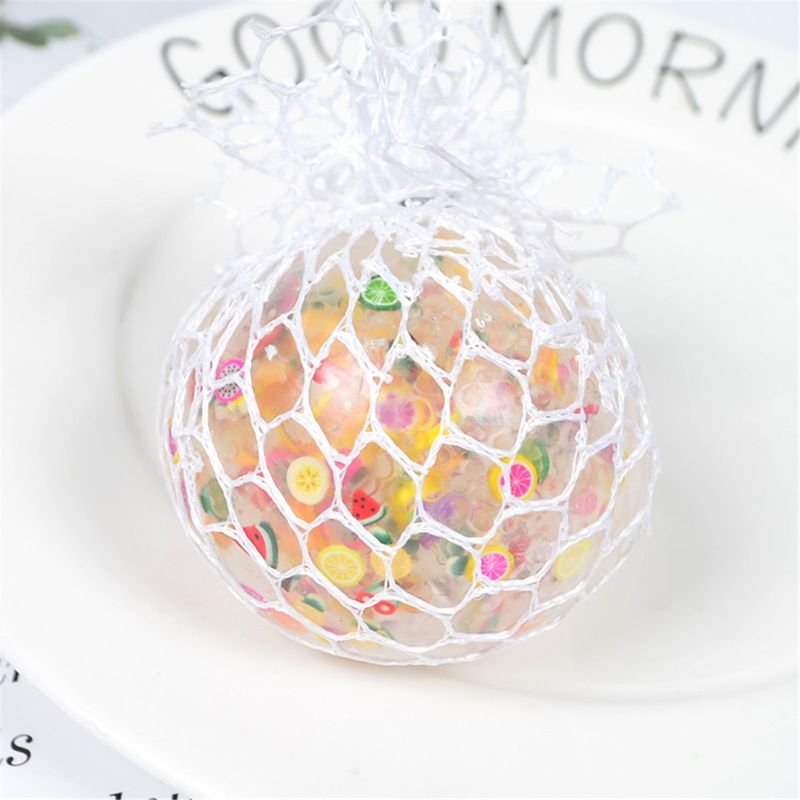Colorful gummy bear treat in a clear mesh bag.