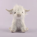 Plush toy of a white fluffy creature.