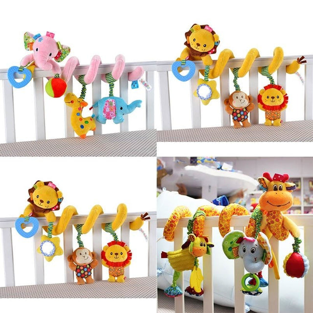Colorful baby crib mobile with animals and toys hanging from a white crib.