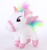 Stuffed unicorn toy with rainbow hair.