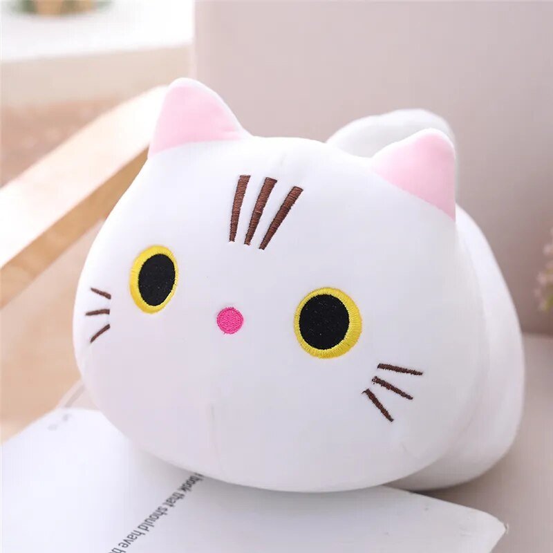 Cute white cat-shaped plush toy with pink ears.