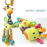 Colorful giraffe-shaped baby toy with multiple attachments.