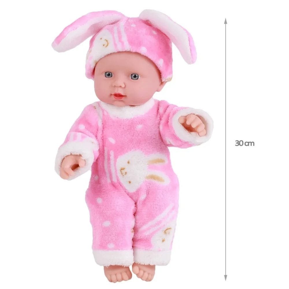 Baby doll in a pink bunny outfit with a measurement label.