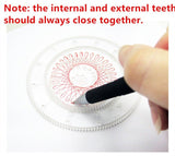 Hand holding a pen drawing on a transparent circular object with text about internal and external teeth.