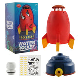 Red toy water rocket with packaging, nozzle, and stickers.