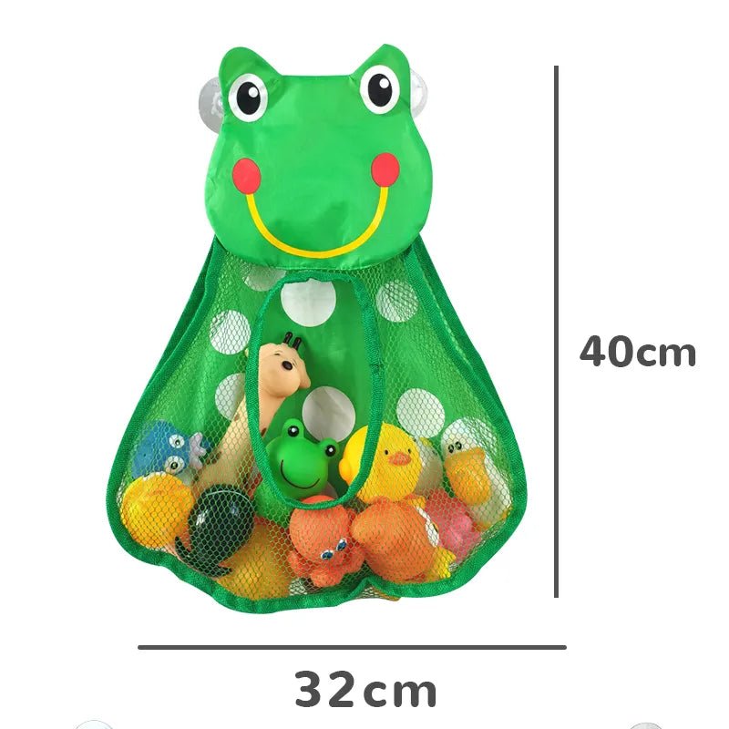 Green mesh bag with frog design filled with colorful bath toys, showing dimensions on a white background.