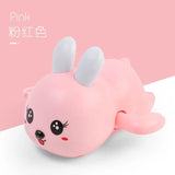 Pink plush toy with rabbit ears.