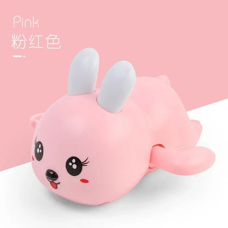 Pink plush toy with rabbit ears.