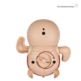 Beige mechanical toy with a central circular design.