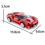 Red toy car with measurements.