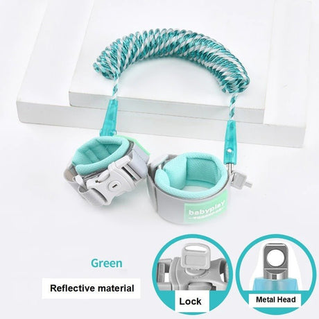 Green baby leash with reflective material, lock, and metal head.