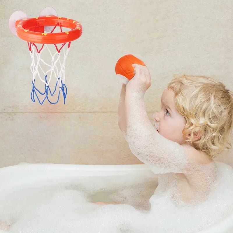 Child playing with a bath-time basketball hoop and ball.