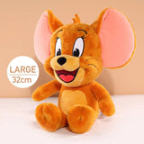 Large plush toy mouse with a smile.