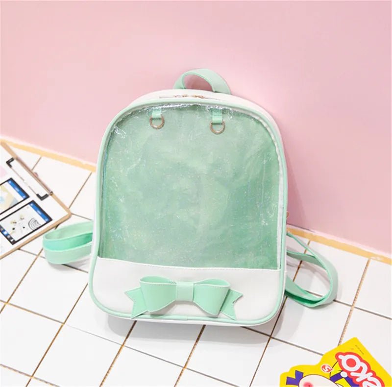 Green backpack with a bow
