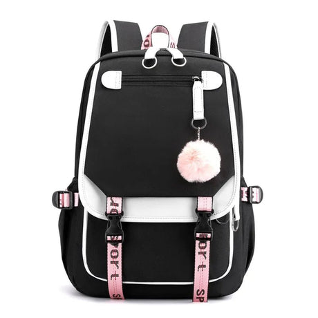 Black and white backpack with pink straps and a pom-pom charm.