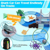 Toy track set with a shark car and ocean-themed elements 