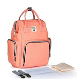 Peach-colored backpack with accessories.