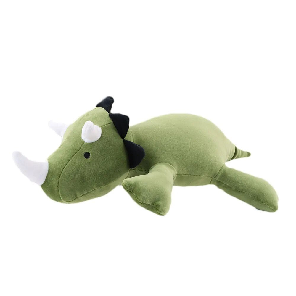 Green dinosaur plush toy on a white background