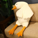 Plush duck toy on a brown chair